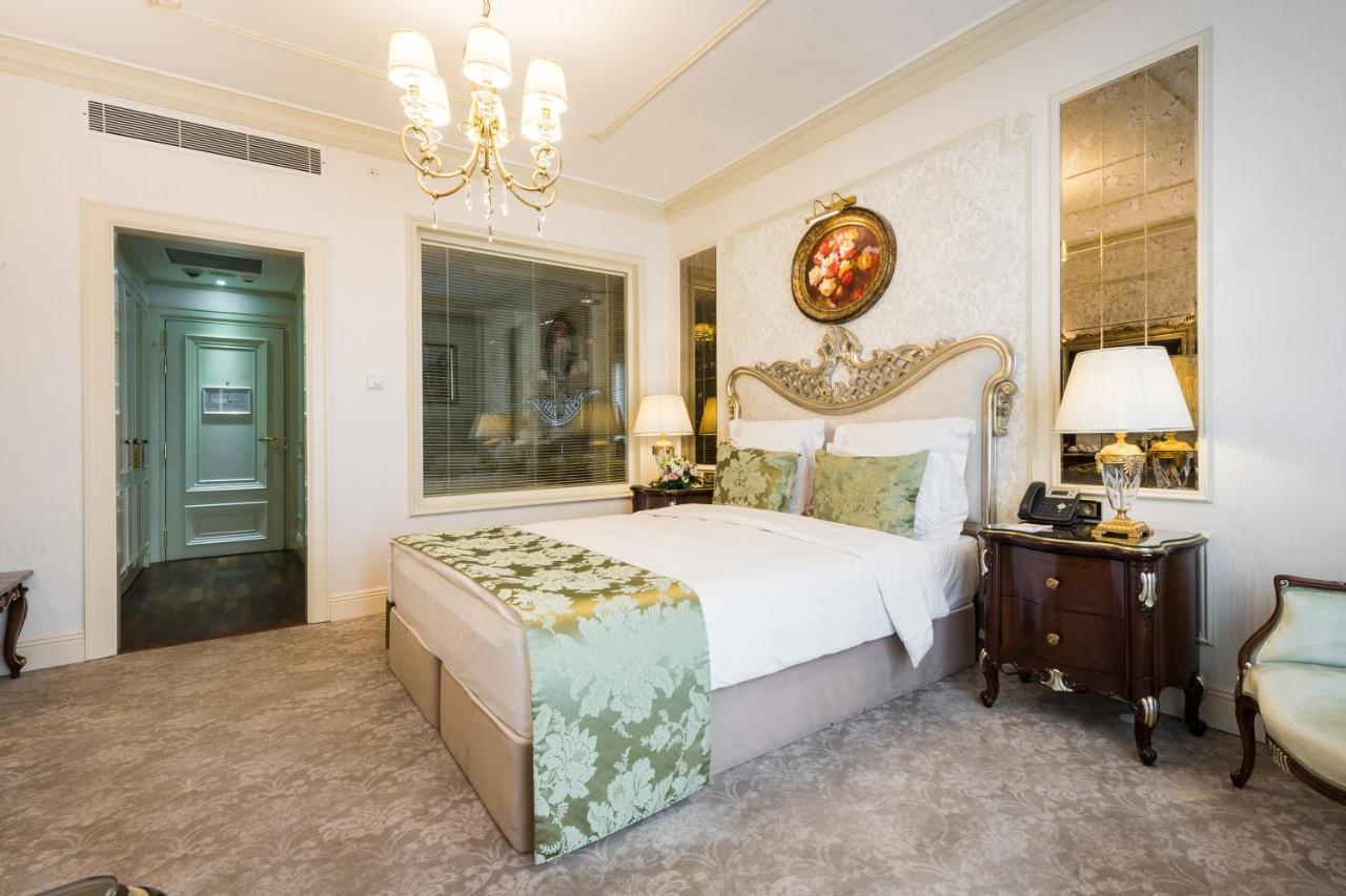 Rixos Khadisha Shymkent Hotel Luaran gambar A bedroom at the hotel