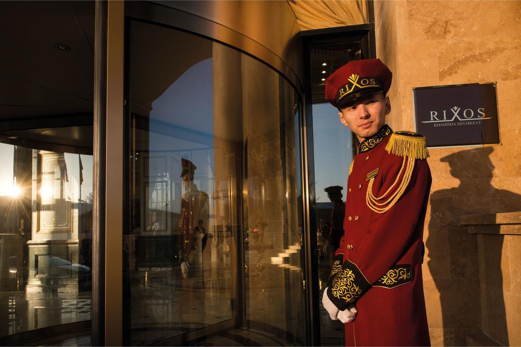 Rixos Khadisha Shymkent Hotel Luaran gambar A doorman at the entrance of a hotel